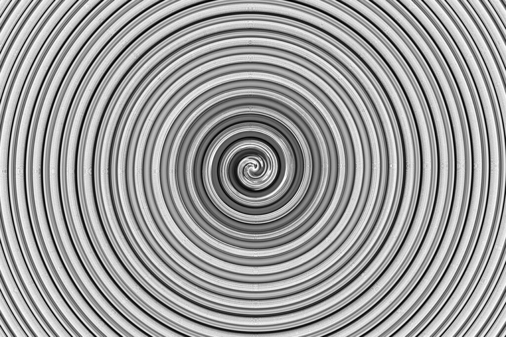 Intricate monochrome spiral design creates a mesmerizing abstract visual effect.